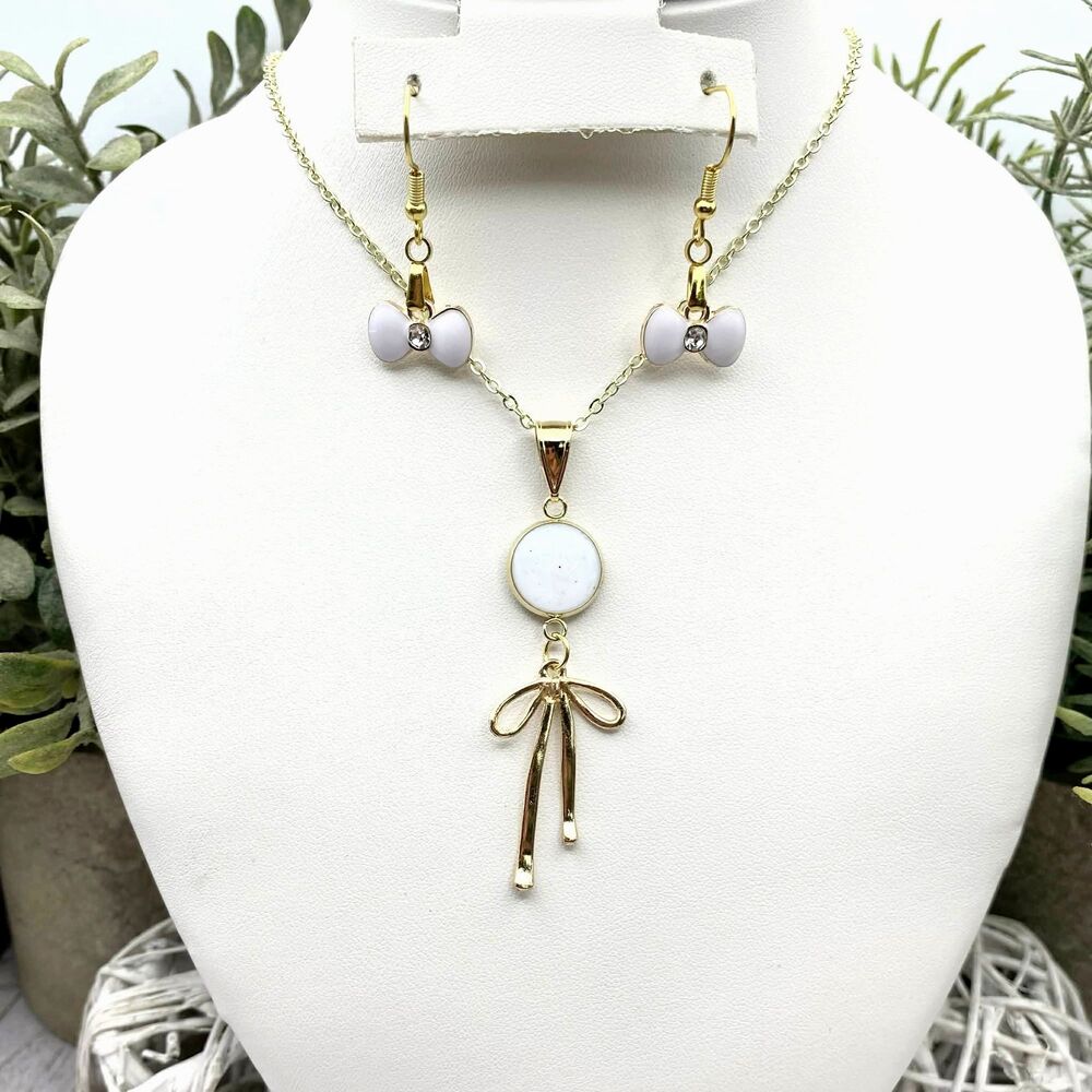Gold Tone Bow Pendant Necklace & Matching Earrings Set White Enamel
